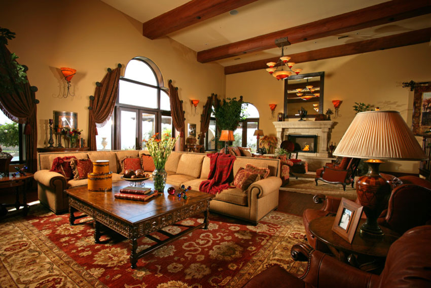 Tuscan family room photo in San Diego