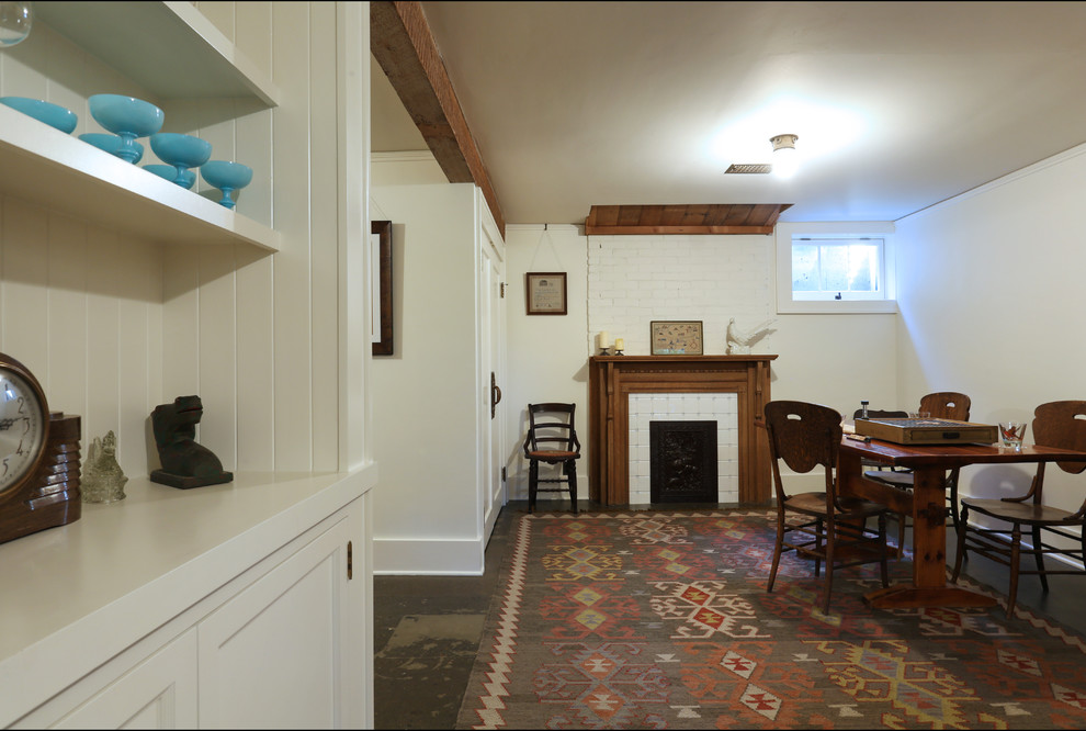 Свежая идея для дизайна: гостиная комната с бетонным полом - отличное фото интерьера