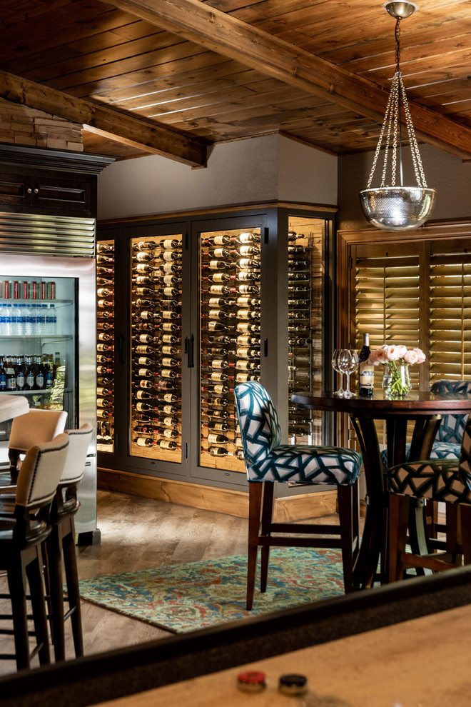 Design ideas for an expansive classic wine cellar in Other with porcelain flooring and grey floors.