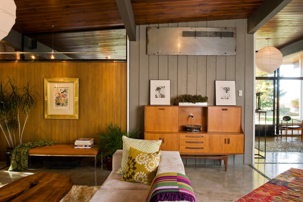 This is an example of a midcentury games room in Other.