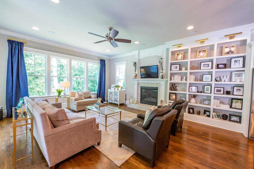 Transitional family room photo in Raleigh