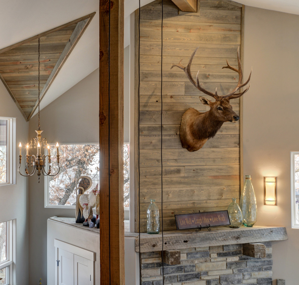Inspiration for a rustic games room in Albuquerque with grey walls.