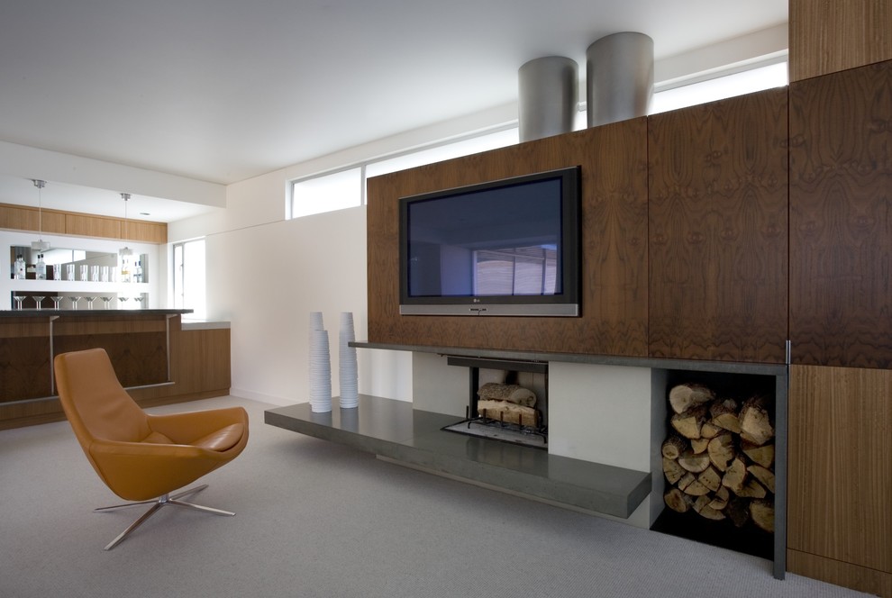 Diseño de sala de estar minimalista con marco de chimenea de hormigón