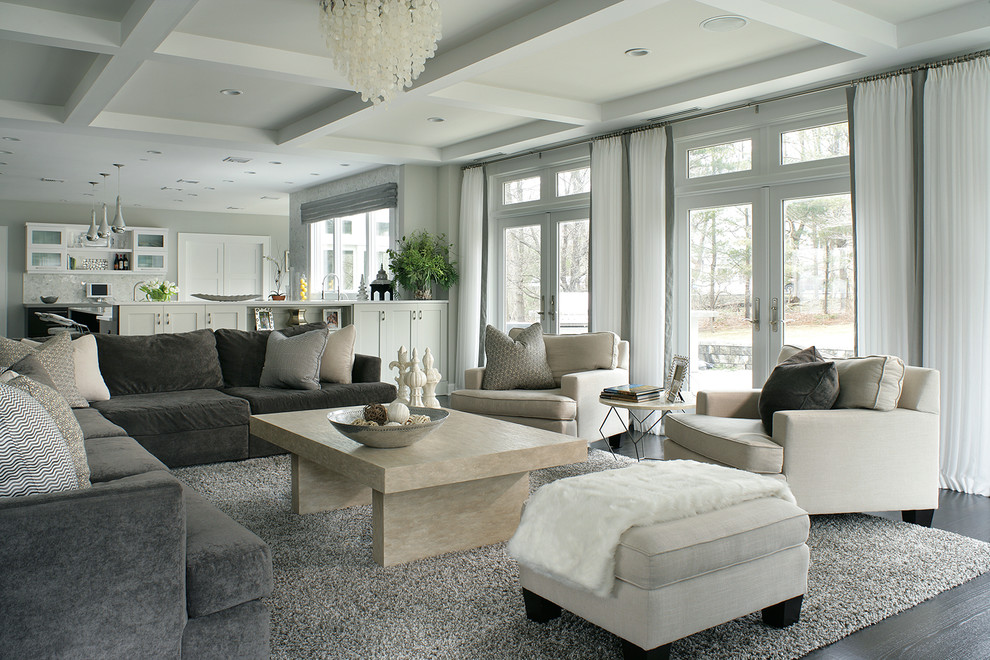 Inspiration for a contemporary open concept dark wood floor family room remodel in New York with gray walls