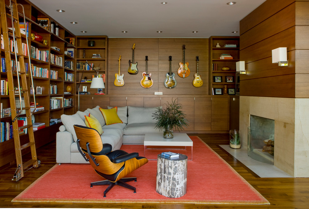 Idée de décoration pour une salle de séjour design avec une salle de musique.