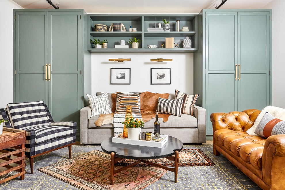 Transitional medium tone wood floor and blue floor family room photo in Philadelphia with white walls