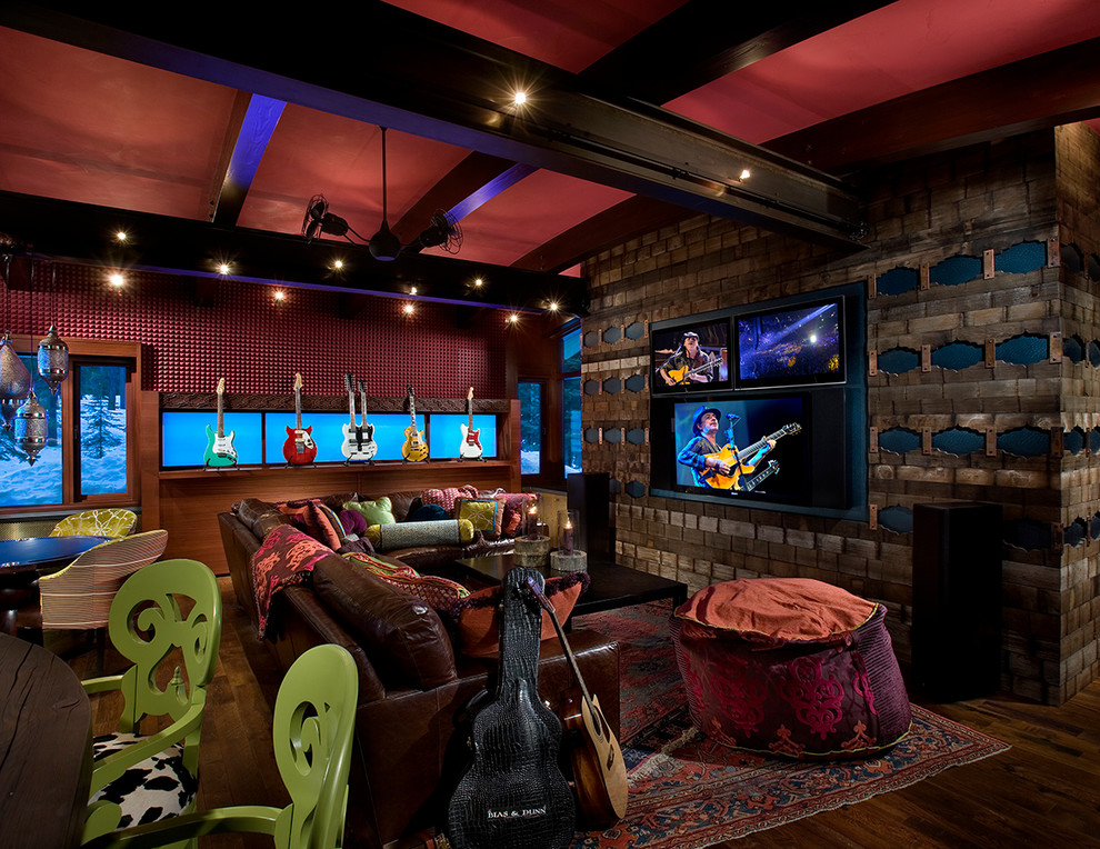 Inspiration for a large eclectic enclosed games room in Orange County with a music area, a built-in media unit, brown floors, multi-coloured walls and dark hardwood flooring.