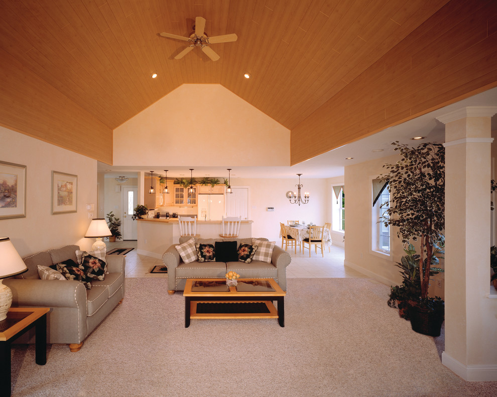Large elegant open concept carpeted family room photo in New York with white walls