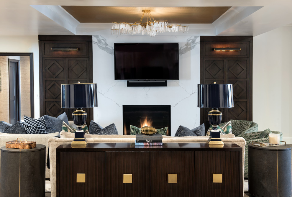 Photo of an expansive contemporary open plan games room in Salt Lake City with white walls, dark hardwood flooring, a standard fireplace, a stone fireplace surround, a wall mounted tv, brown floors, a drop ceiling and panelled walls.