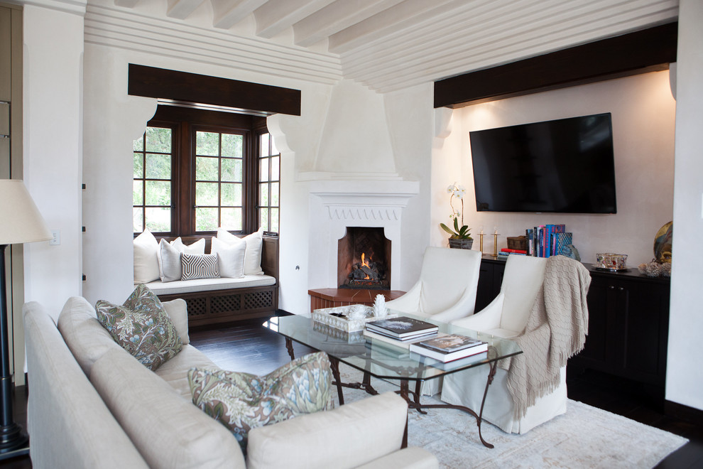Example of a tuscan family room design in Santa Barbara