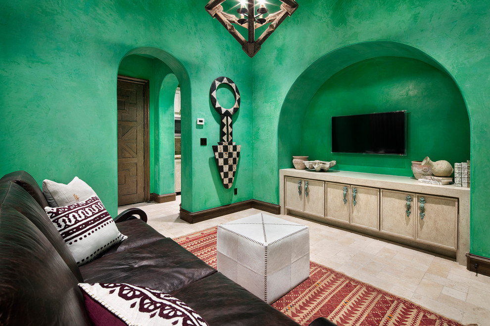 Photo of a medium sized mediterranean enclosed games room in Houston with green walls, marble flooring, a wall mounted tv and beige floors.