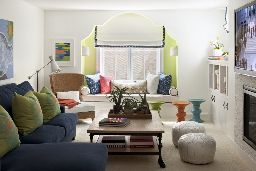 Eclectic carpeted and beige floor family room photo in Minneapolis with white walls, a standard fireplace and a wall-mounted tv