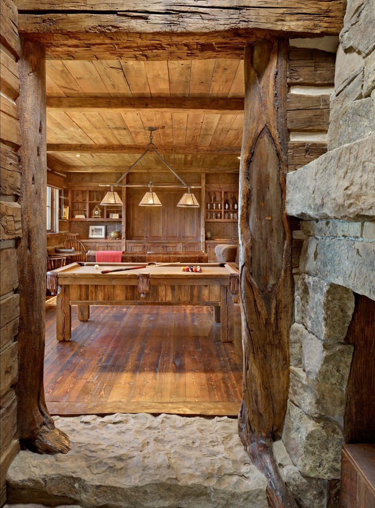 Photo of a medium sized rustic games room in Other with medium hardwood flooring.