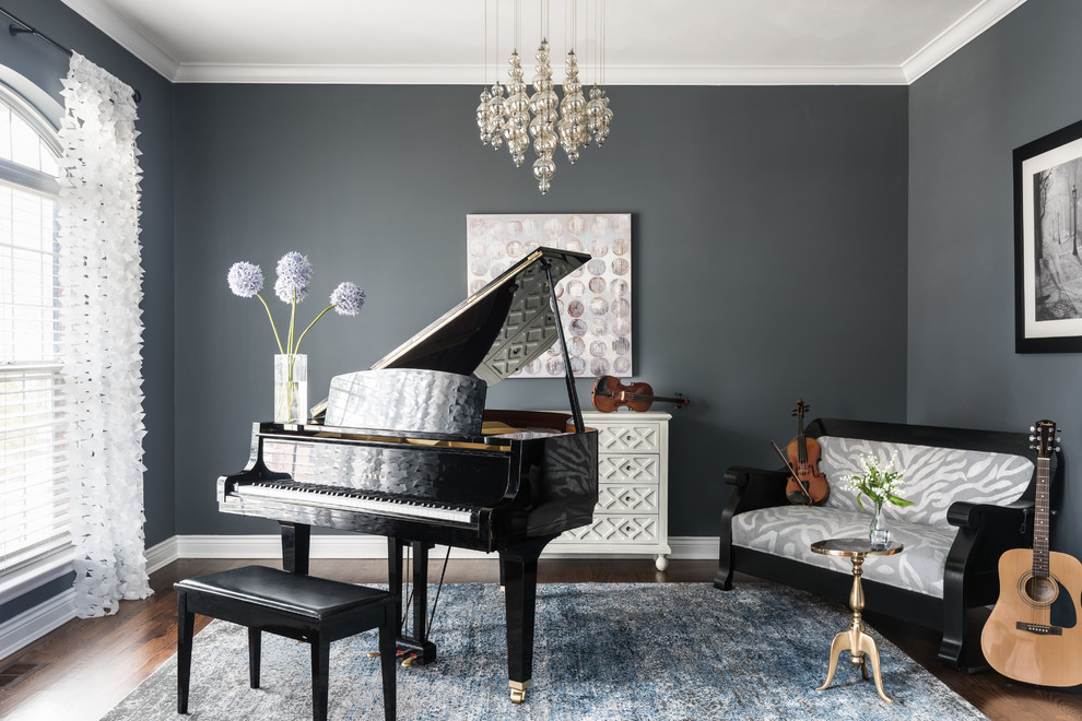 Family room - mid-sized transitional enclosed brown floor and dark wood floor family room idea in St Louis with a music area, gray walls and no fireplace