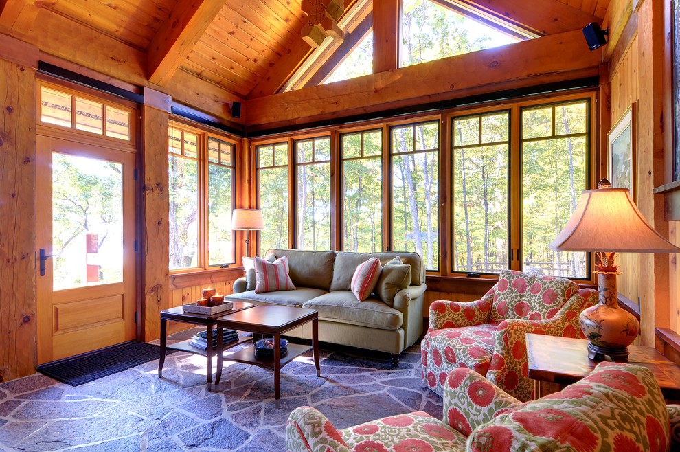Example of a mountain style family room design in Toronto