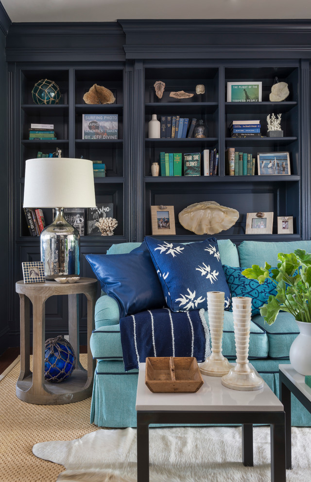 Family room - coastal dark wood floor family room idea in Providence with blue walls