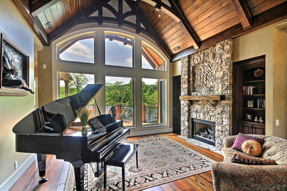 Family room - large craftsman open concept dark wood floor family room idea in Atlanta with a music area, beige walls, a standard fireplace and a stone fireplace