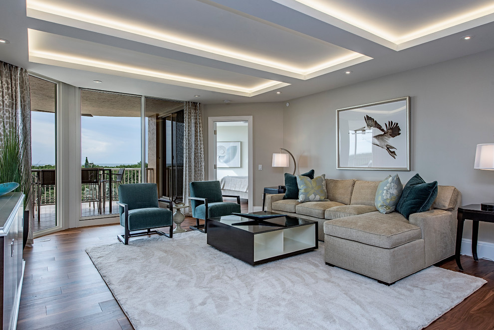 Example of a beach style family room design in Tampa