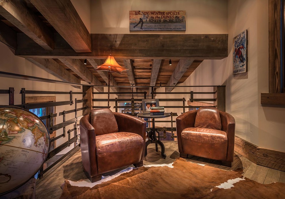 Design ideas for a small rustic mezzanine games room in Sacramento with beige walls and dark hardwood flooring.