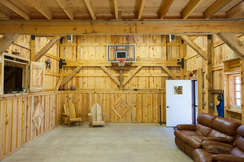 Example of a farmhouse family room design in Other