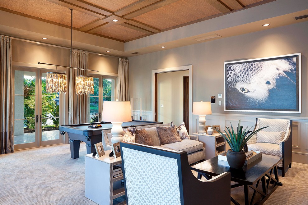 Immagine di un soggiorno design con pareti beige e moquette