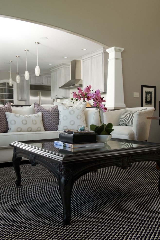 Inspiration for a mid-sized transitional open concept dark wood floor family room remodel in Indianapolis with beige walls, no fireplace and no tv