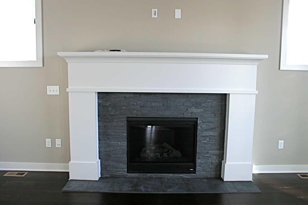 Example of a transitional family room design in Milwaukee