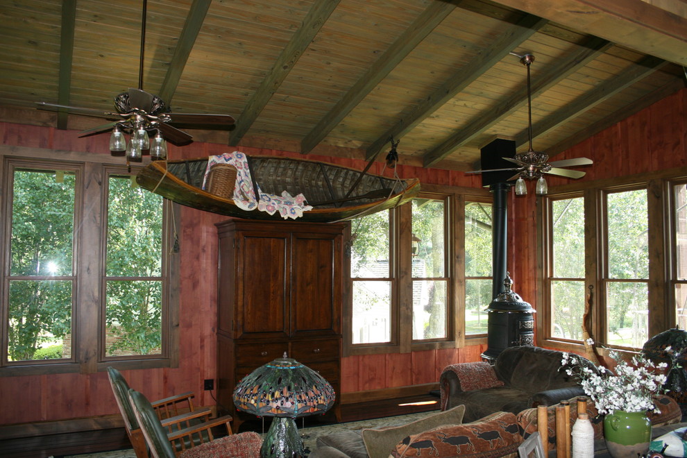 Example of an arts and crafts family room design in New Orleans