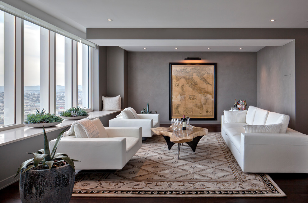 Trendy dark wood floor family room photo in San Francisco with gray walls