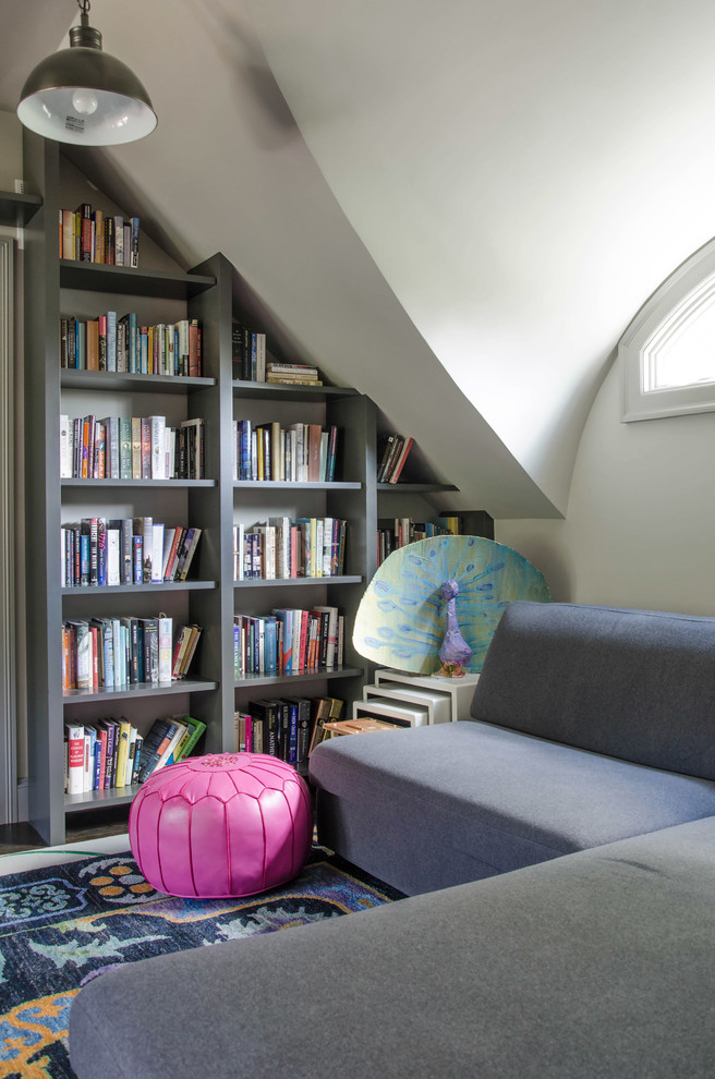 This is an example of a classic games room in Boston with a reading nook and white walls.