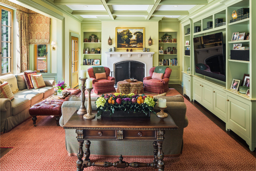 Inspiration for a timeless dark wood floor family room remodel in New York with green walls, a standard fireplace and a wall-mounted tv