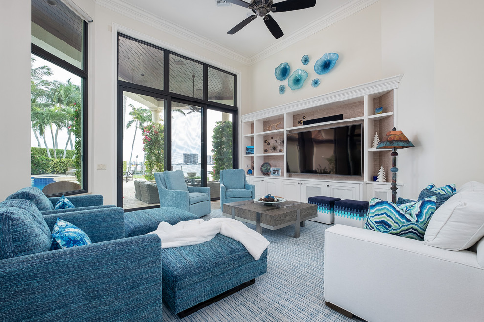 Family room - coastal family room idea in Miami