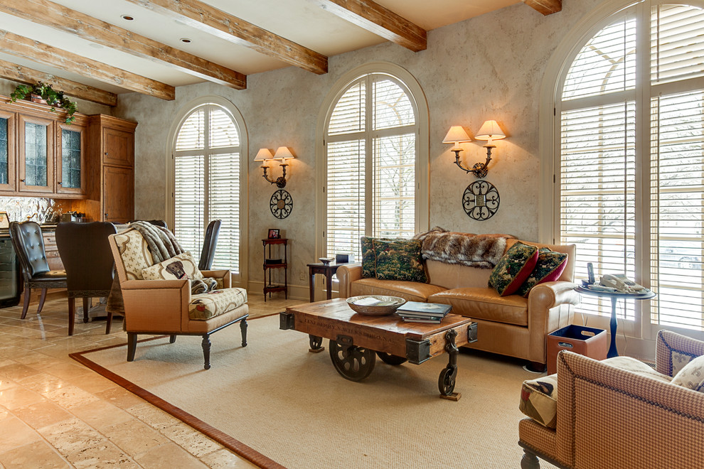 This is an example of a large traditional open plan games room in Columbus with a home bar, white walls, travertine flooring, no fireplace, no tv and beige floors.