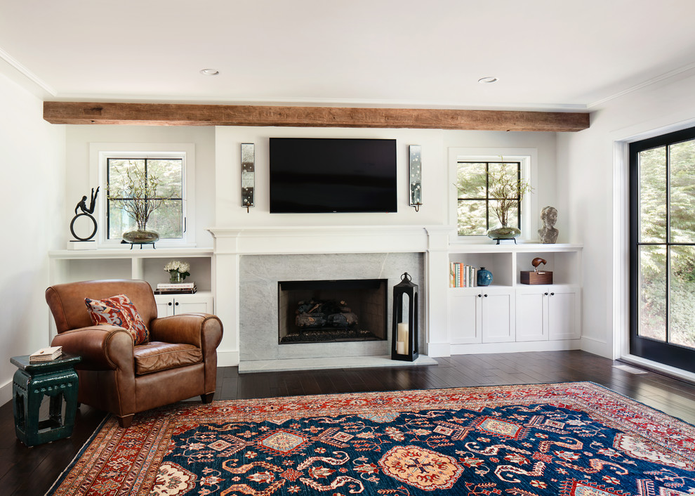 Inspiration for a large country open concept dark wood floor family room remodel in New York with a standard fireplace, a tile fireplace and a wall-mounted tv