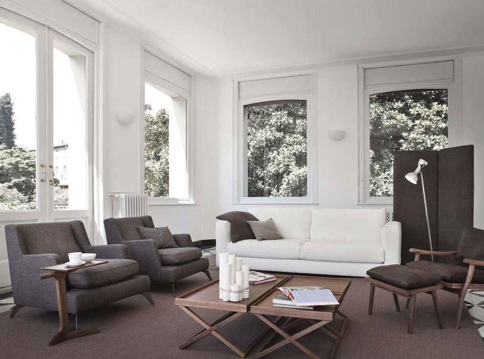 Foto di un soggiorno design con pareti bianche