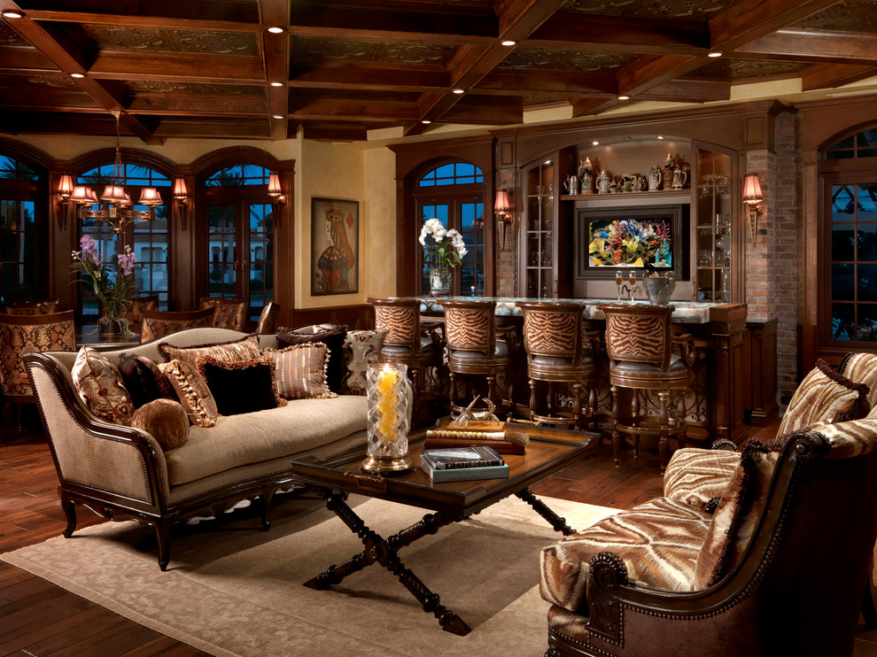 Tuscan family room photo in Miami