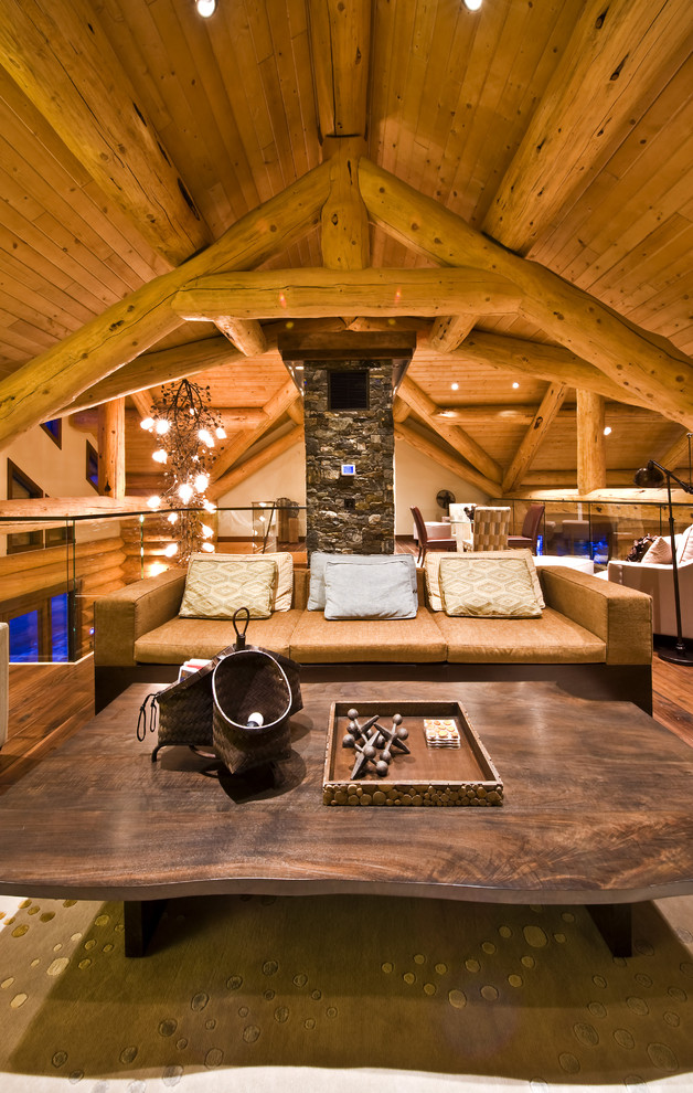Inspiration for a rustic family room remodel in Vancouver with beige walls