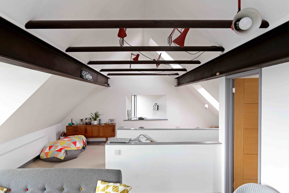 Inspiration for a medium sized contemporary mezzanine games room in Wiltshire with white walls, carpet and beige floors.
