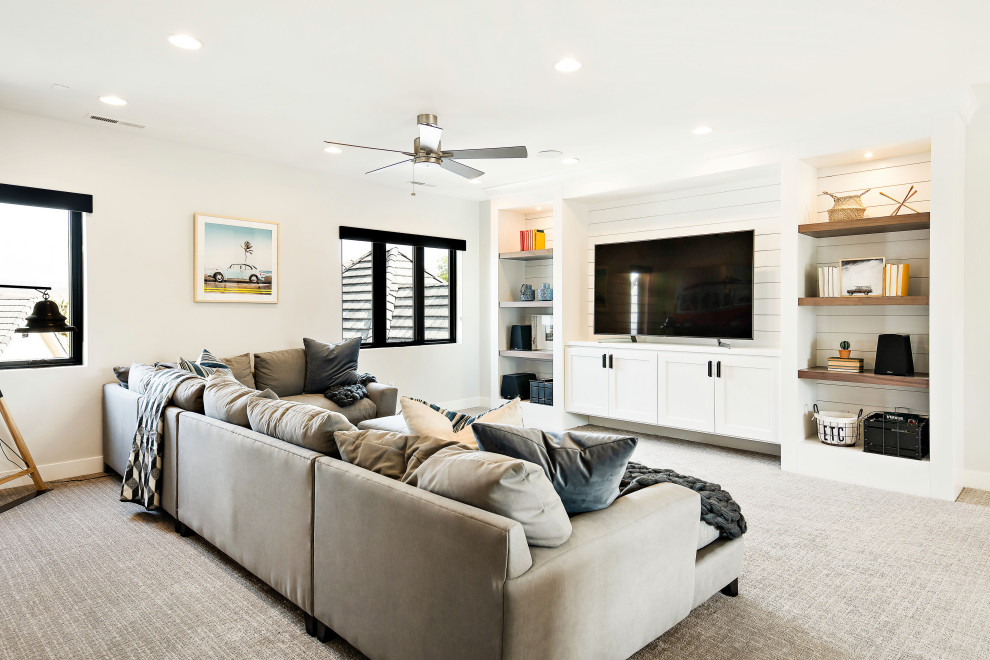 Inspiration for a country open plan games room in Salt Lake City with a game room, white walls, carpet, no fireplace, a freestanding tv and grey floors.