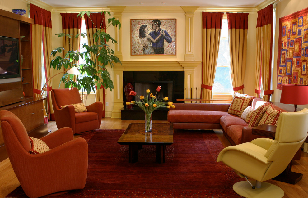 Large transitional family room photo in New York with yellow walls, a standard fireplace, a stone fireplace and a media wall