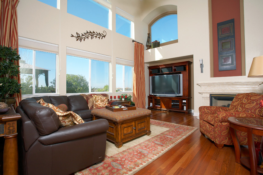 Example of a classic family room design in Sacramento