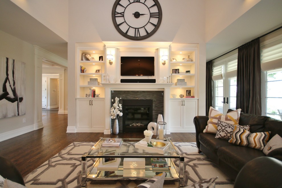 Family room - large transitional open concept medium tone wood floor family room idea in Ottawa with beige walls