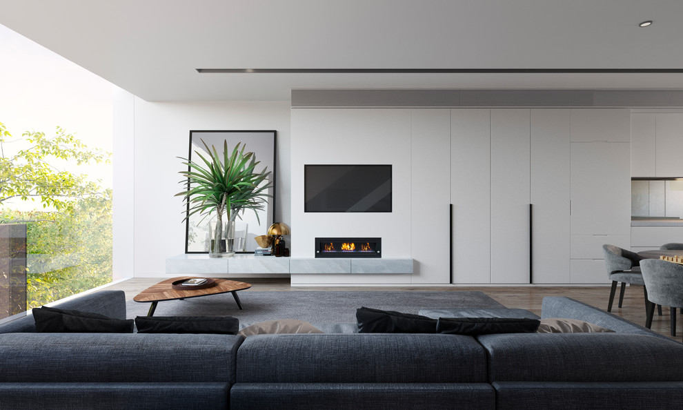 Ejemplo de sala de estar abierta minimalista con paredes blancas, chimenea lineal y pared multimedia
