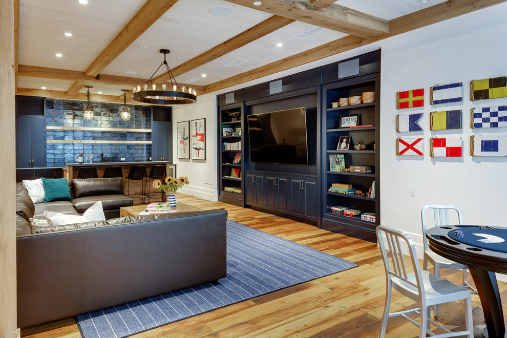 Inspiration for a nautical games room in Boston with a game room, white walls, medium hardwood flooring, a built-in media unit and brown floors.
