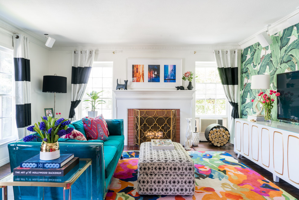 Inspiration for a mid-sized eclectic vinyl floor family room remodel in Los Angeles with multicolored walls, a standard fireplace, a brick fireplace and a wall-mounted tv