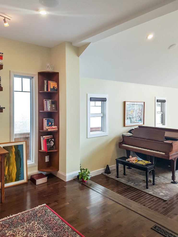 Inspiration for a medium sized traditional open plan games room in Other with a music area, beige walls, dark hardwood flooring, no fireplace, no tv and brown floors.