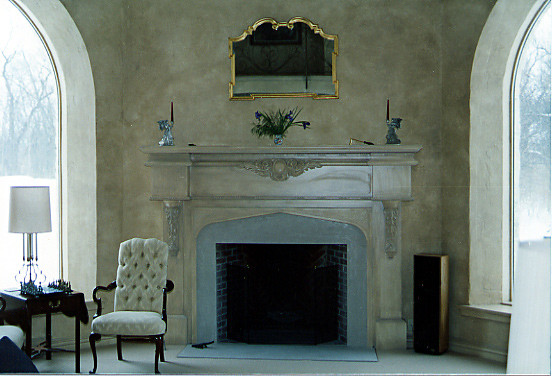 Inspiration for a mid-sized timeless carpeted family room remodel in Milwaukee with a standard fireplace and a stone fireplace