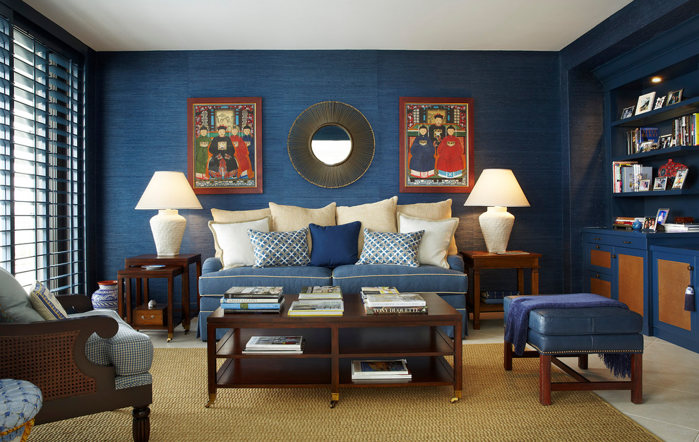Example of a mid-sized transitional open concept beige floor family room design in Miami with blue walls and no tv