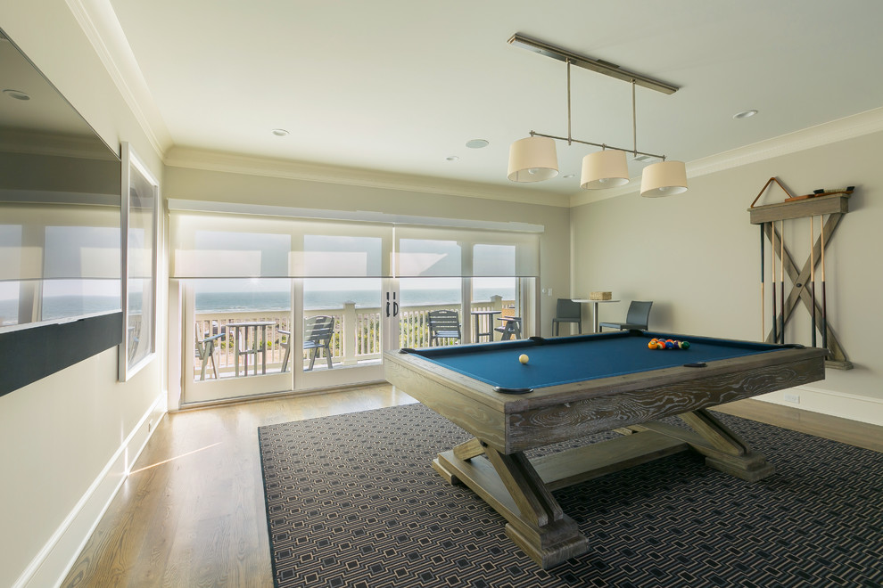 This is an example of a beach style games room in Charleston.