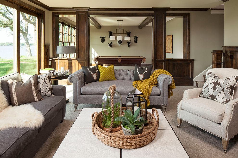 Example of a classic carpeted family room design in Minneapolis with beige walls